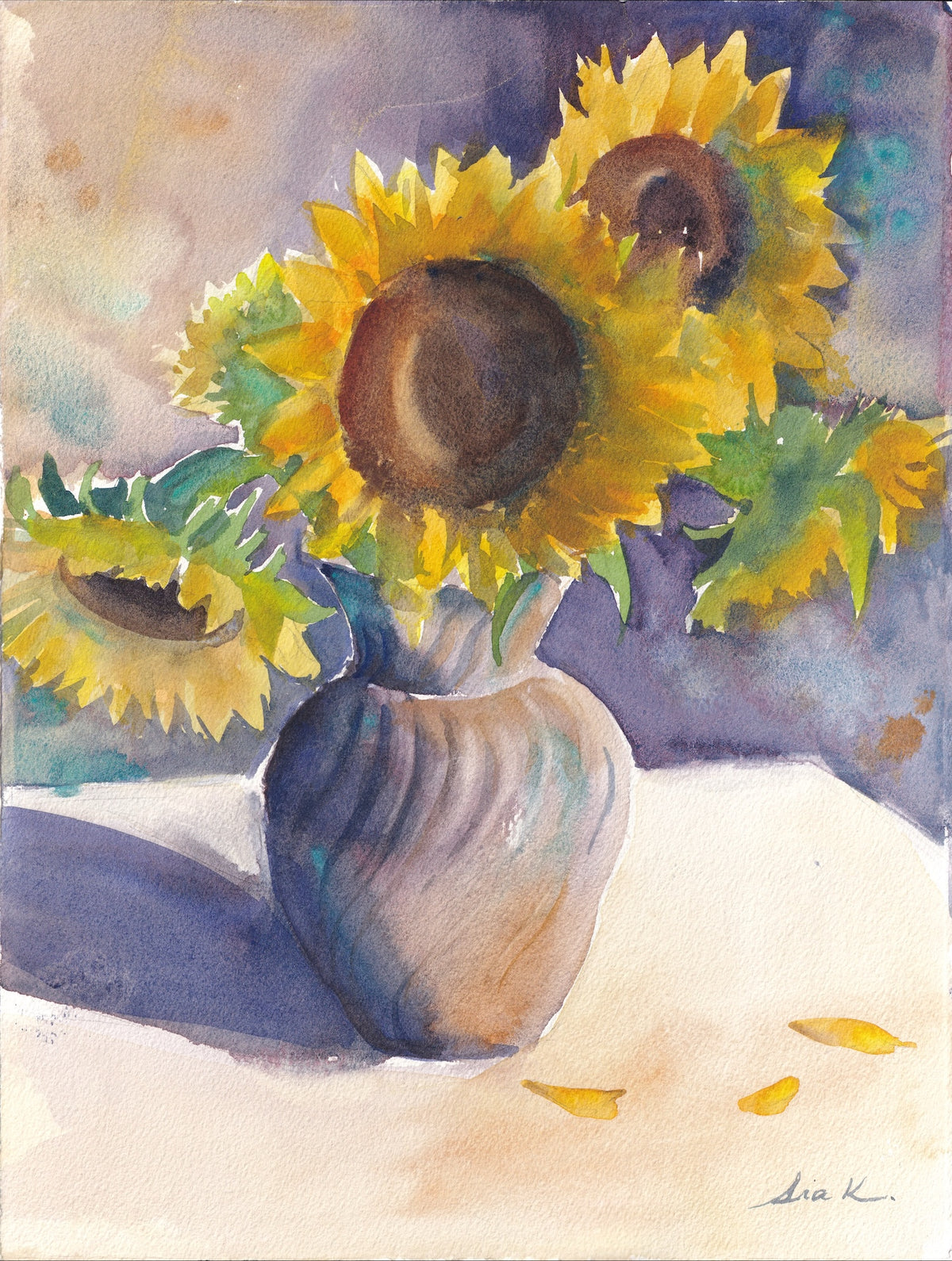 Sunflowers in a metal ridged vase